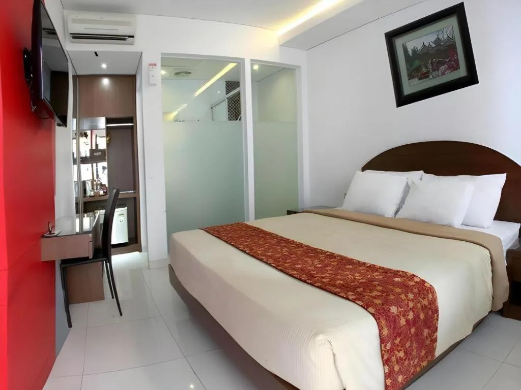 Bed in Kenari Asri Hotel