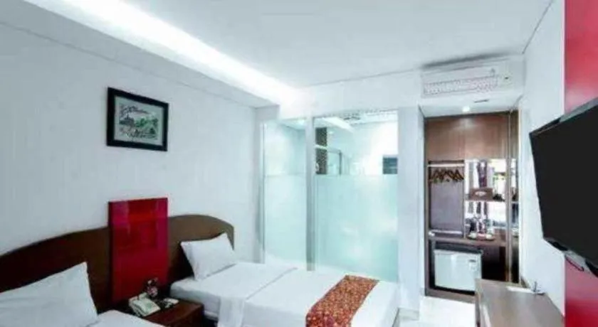 Bed in Kenari Asri Hotel