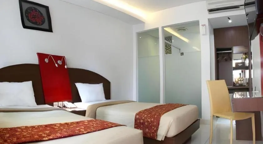 Bed in Kenari Asri Hotel