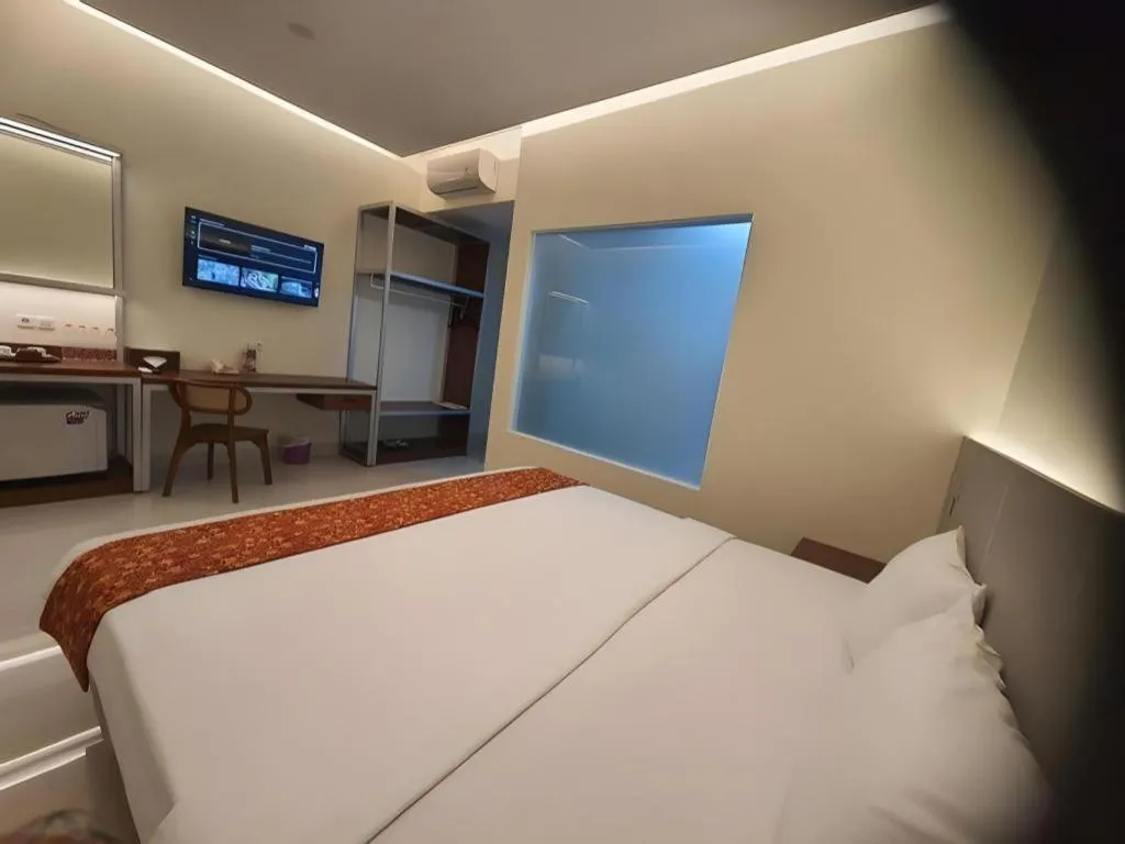 Bed in Kenari Asri Hotel