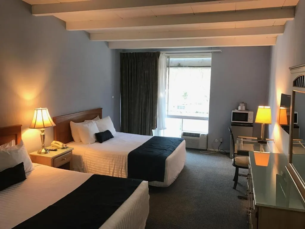 Bed in Highland Gardens Hotel