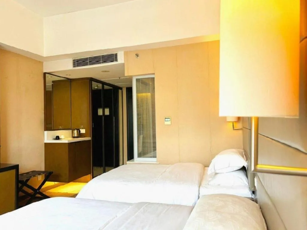 Bed in Jiaxin Conifer Hotel Shunde