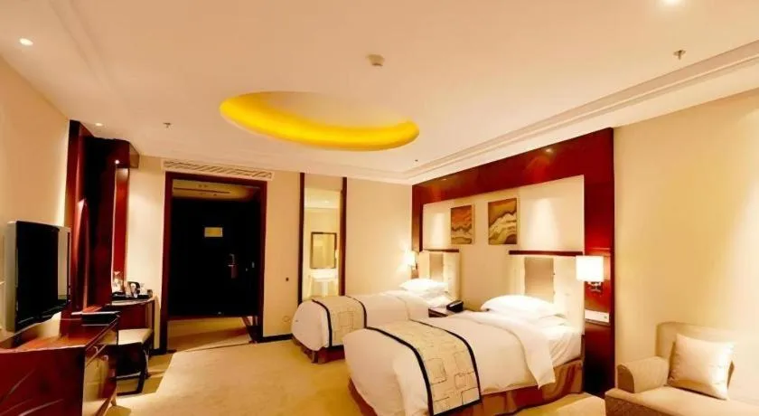 Bed in Northwest Petroleum Hotel