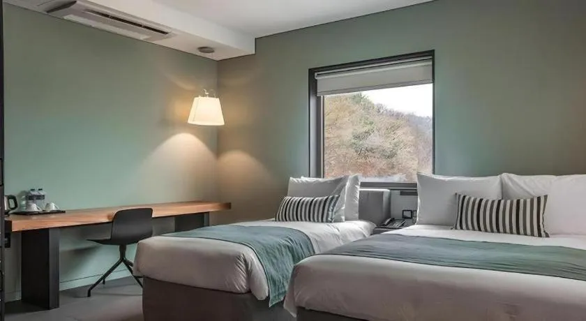 Bed in Everrich Hotel