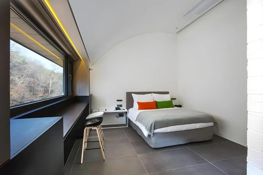 Bed in Everrich Hotel