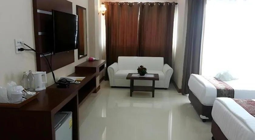 Bed in Le Parc Wangnang Hotel