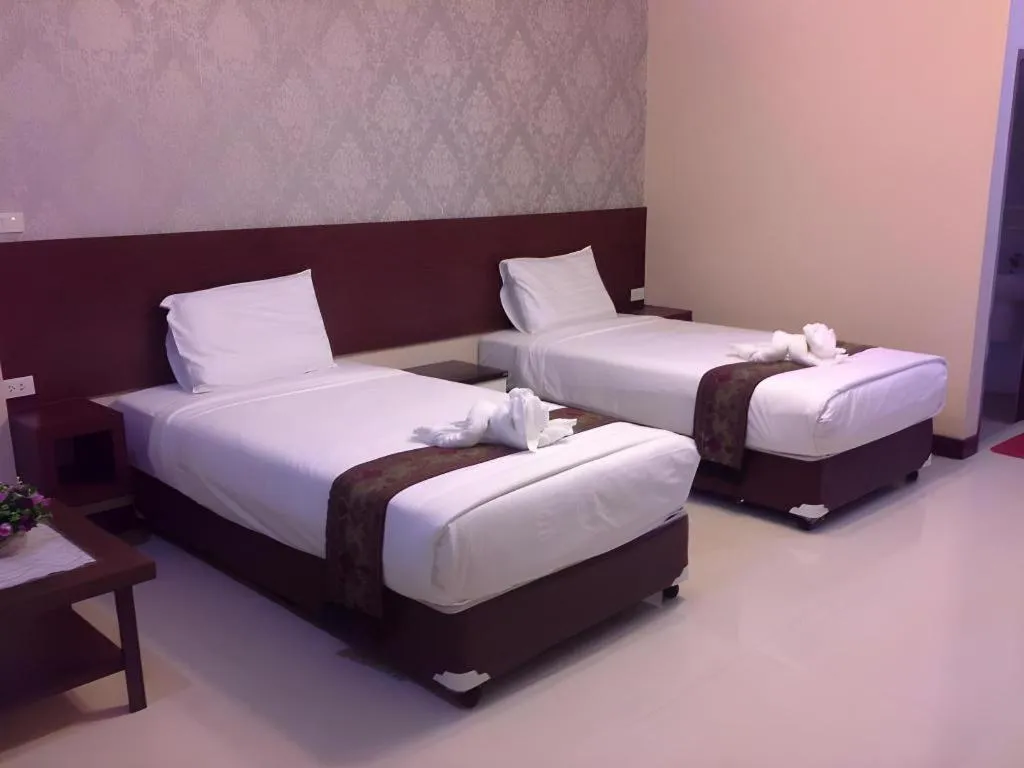 Bed in Le Parc Wangnang Hotel