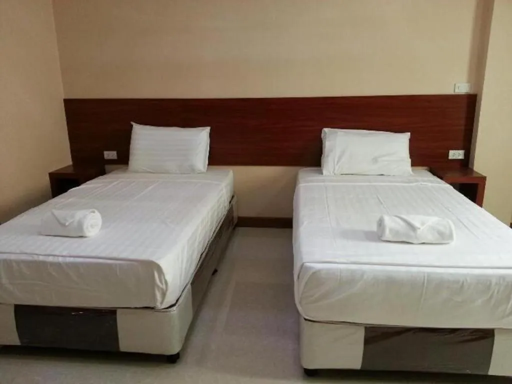 Bed in Le Parc Wangnang Hotel