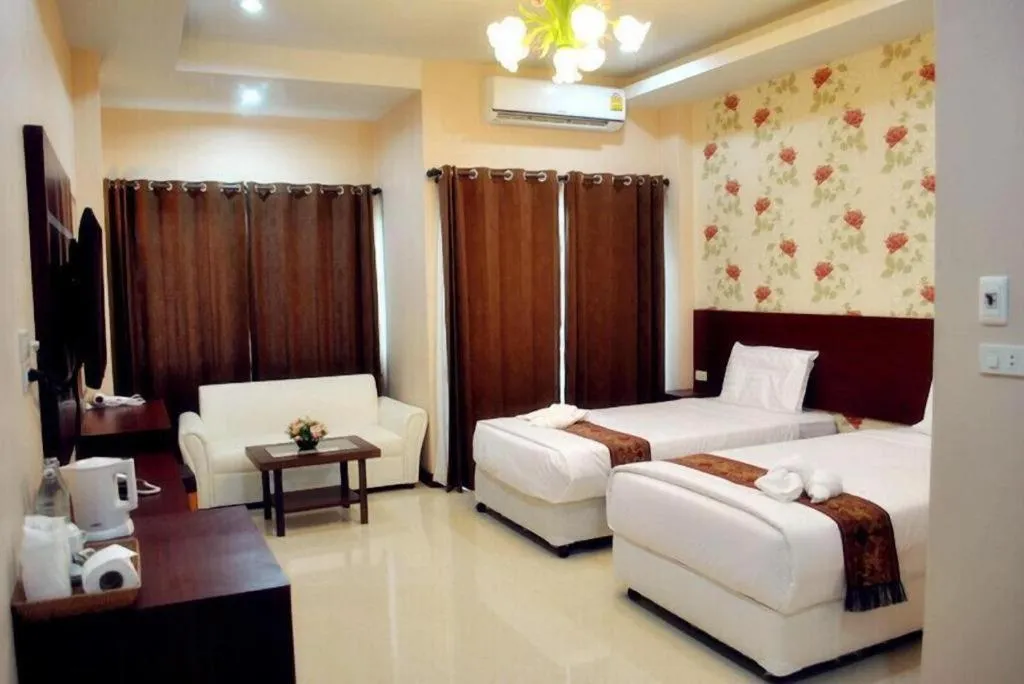 Bed in Le Parc Wangnang Hotel