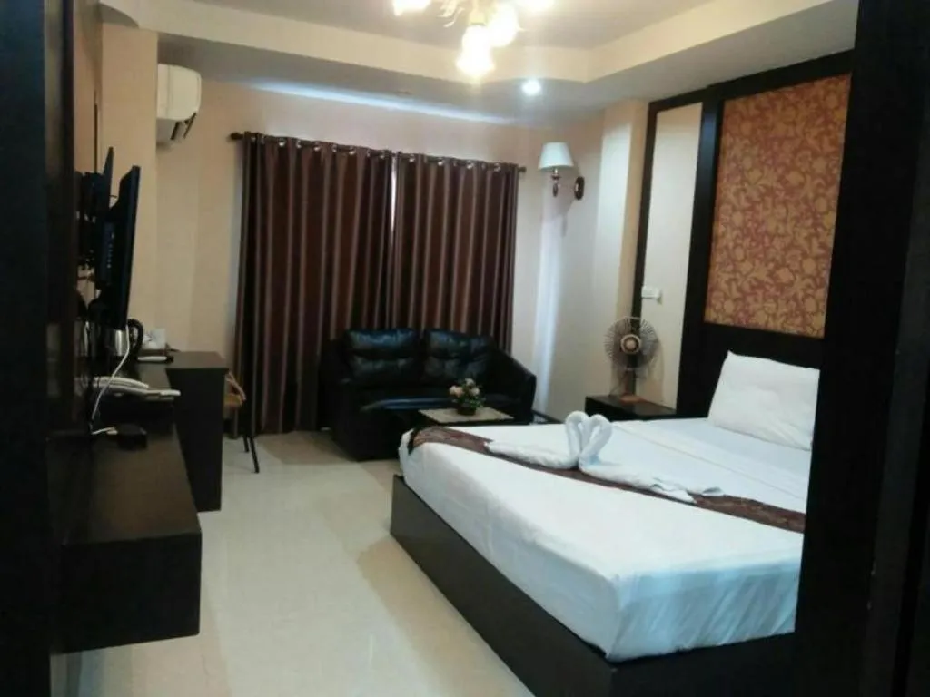 Bed in Le Parc Wangnang Hotel