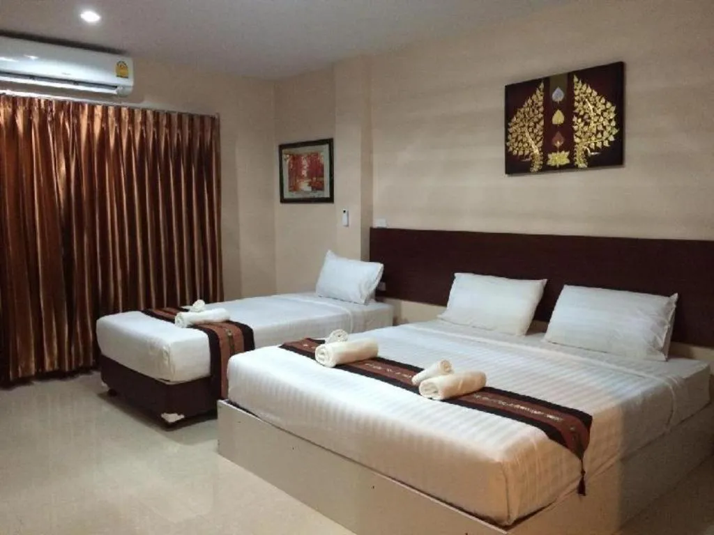 Bed in Le Parc Wangnang Hotel