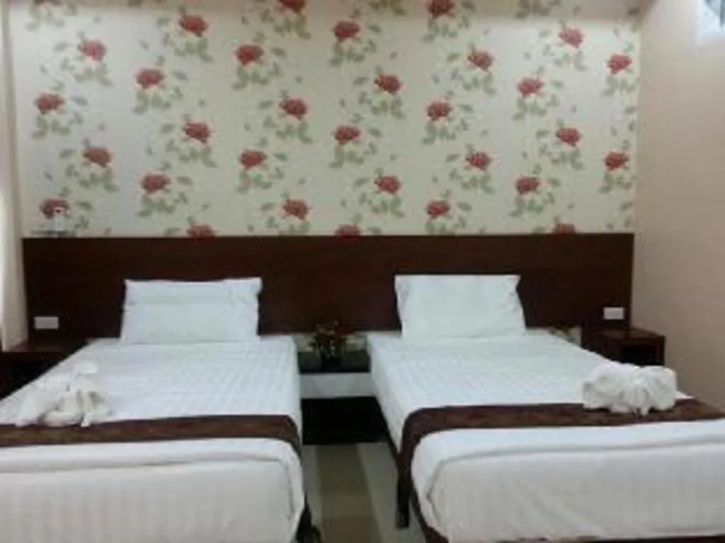 Bed in Le Parc Wangnang Hotel