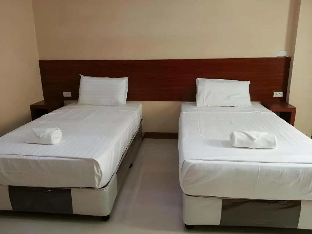 Bed in Le Parc Wangnang Hotel