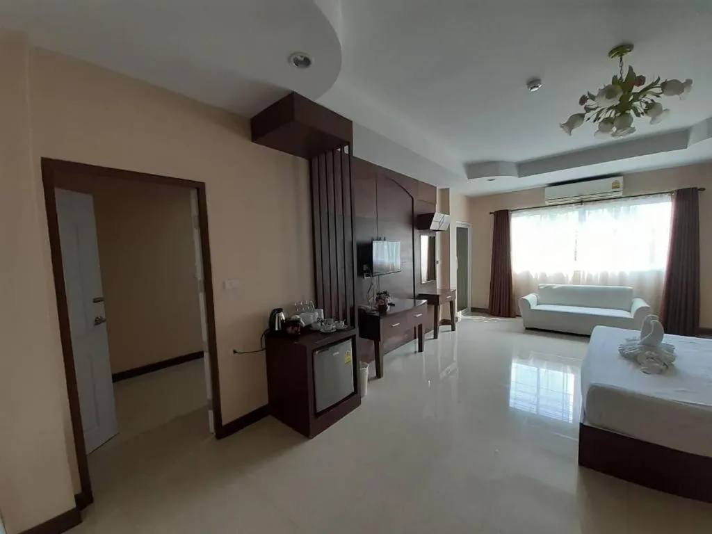 Bed in Le Parc Wangnang Hotel