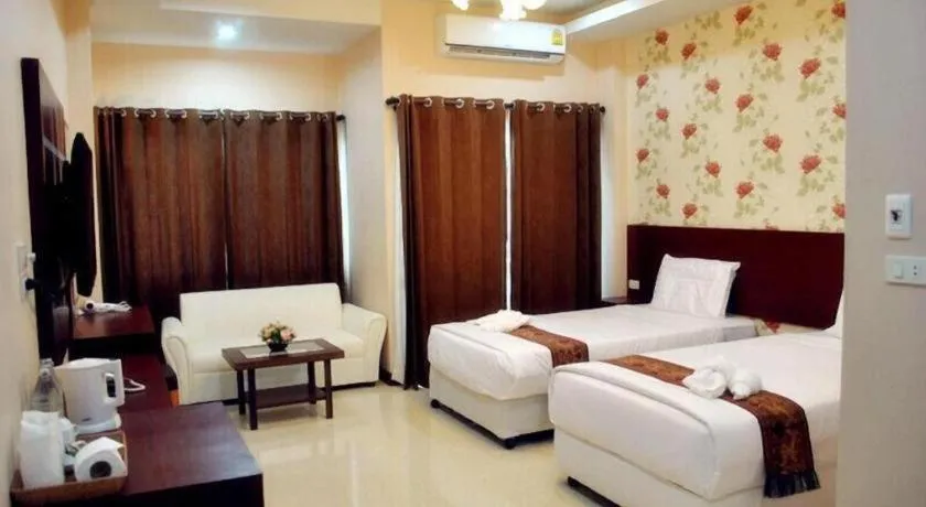 Bed in Le Parc Wangnang Hotel