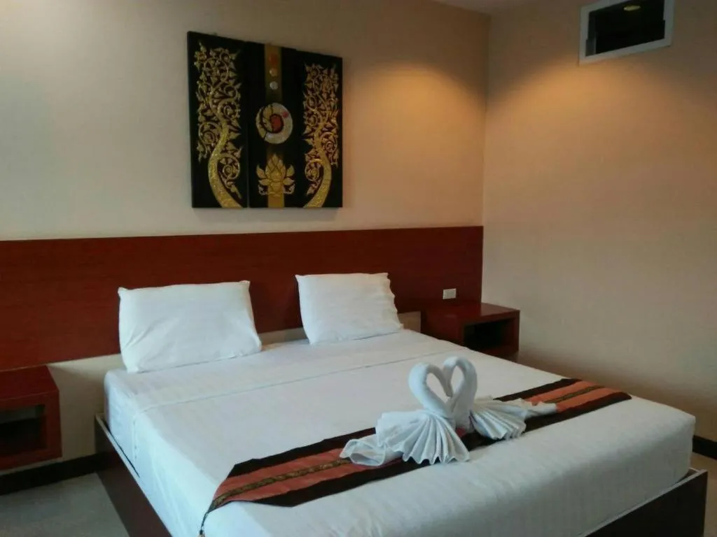 Bed in Le Parc Wangnang Hotel