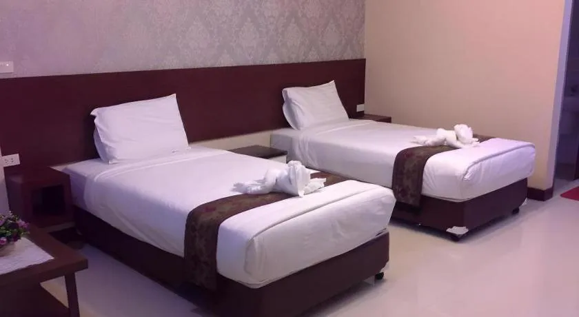 Bed in Le Parc Wangnang Hotel
