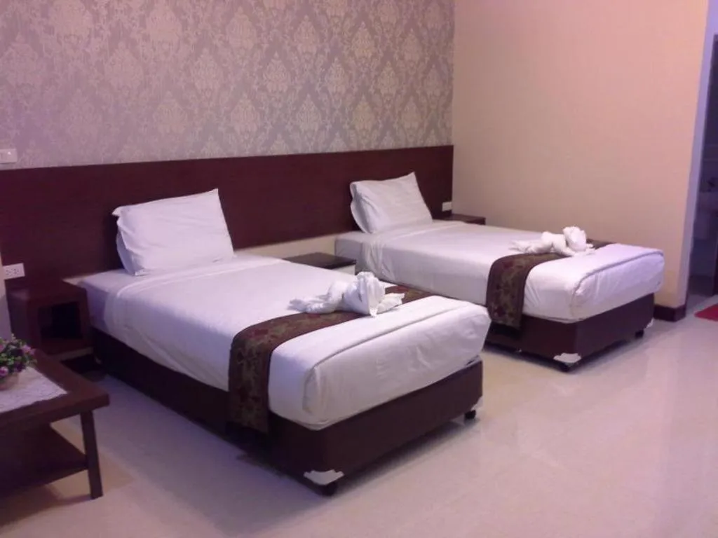Bed in Le Parc Wangnang Hotel