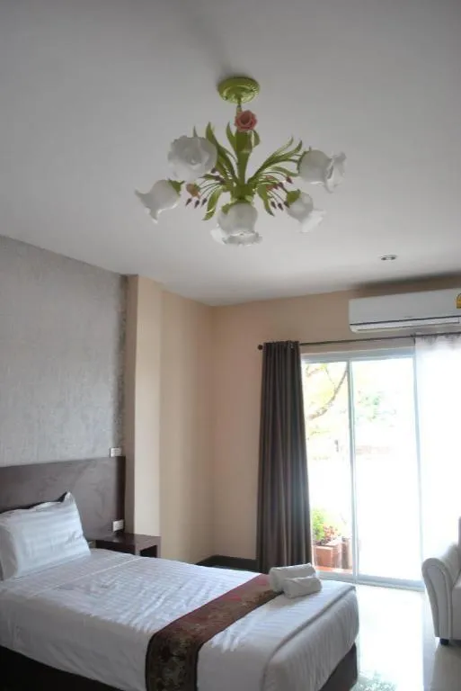 Bed in Le Parc Wangnang Hotel