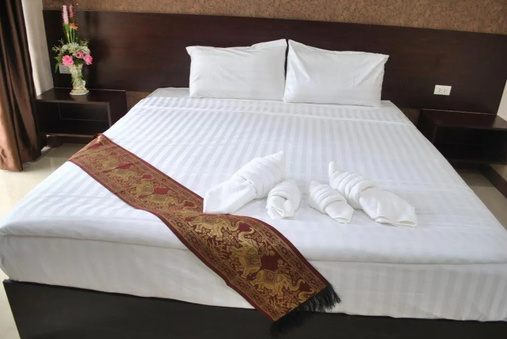 Bed in Le Parc Wangnang Hotel