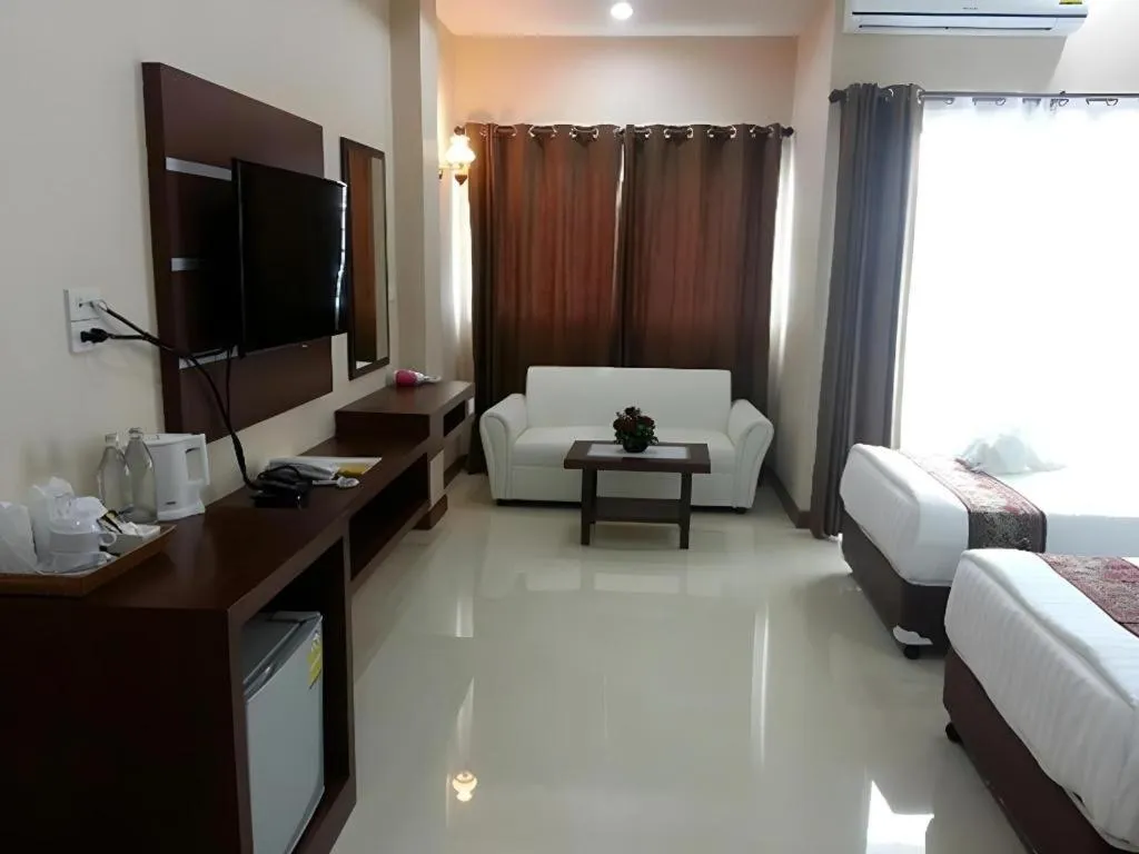 Bed in Le Parc Wangnang Hotel