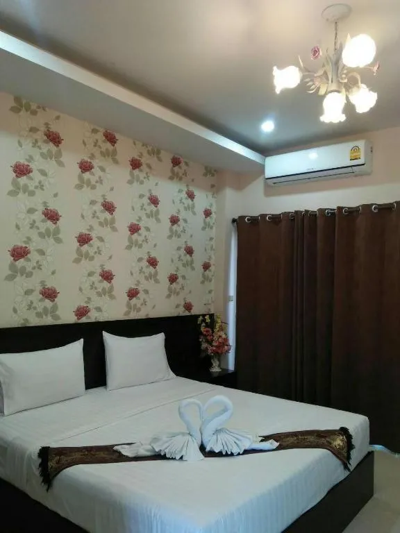 Bed in Le Parc Wangnang Hotel