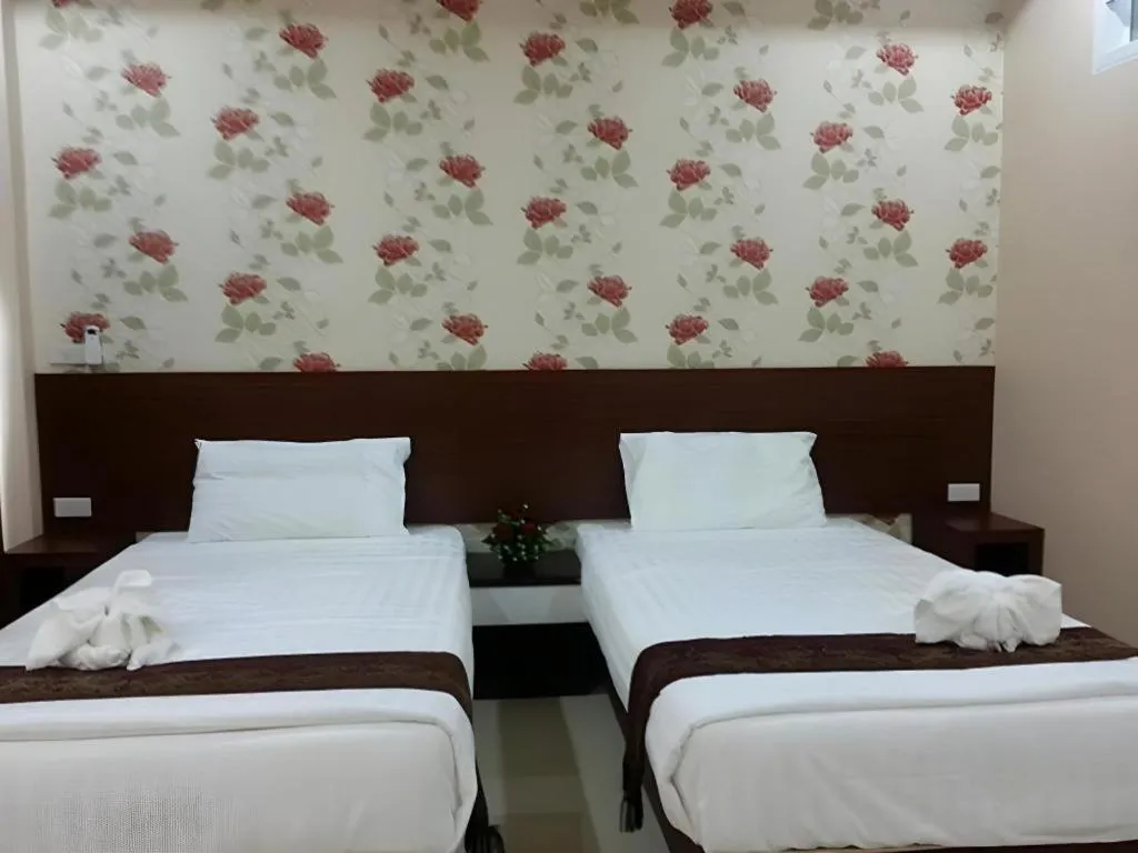 Bed in Le Parc Wangnang Hotel