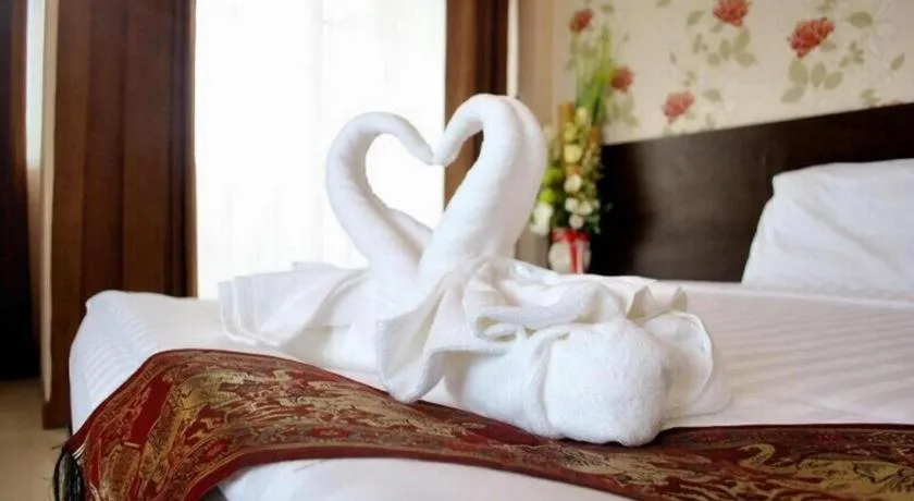 Bed in Le Parc Wangnang Hotel