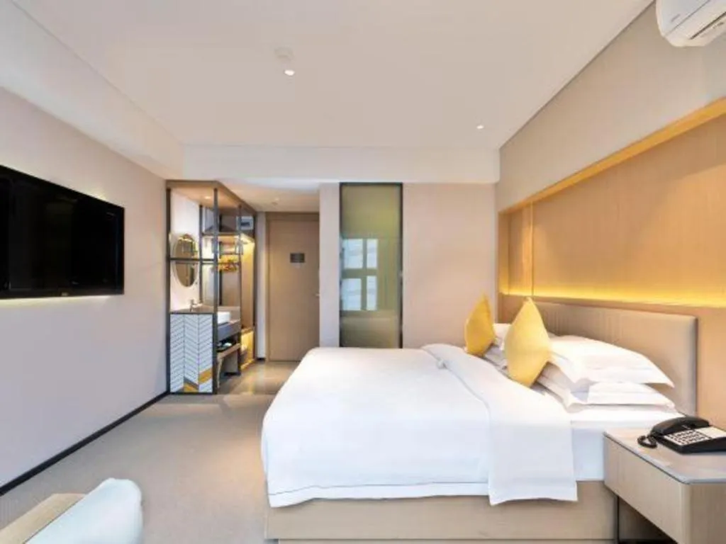 Bed in Nanning Sanzan Hotel