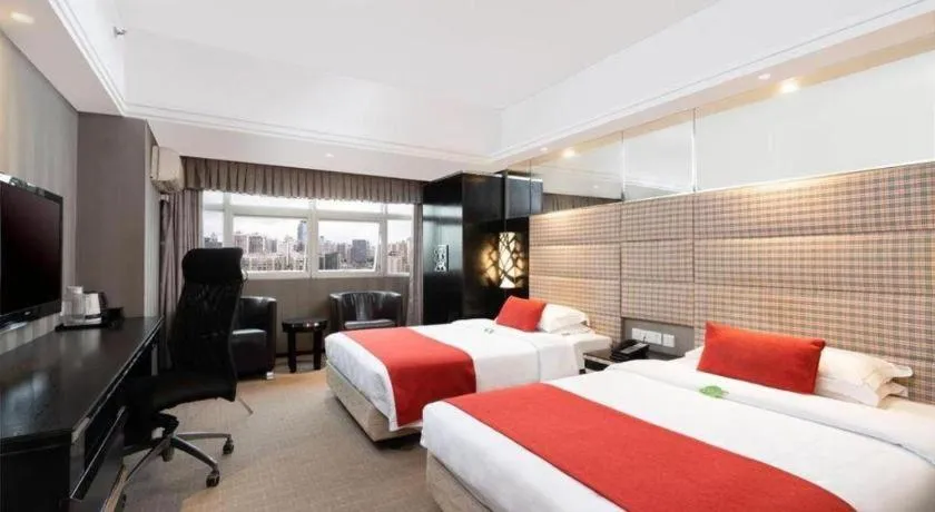 Bed in Nanning Sanzan Hotel