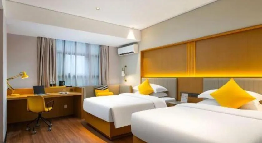 Bed in Nanning Sanzan Hotel
