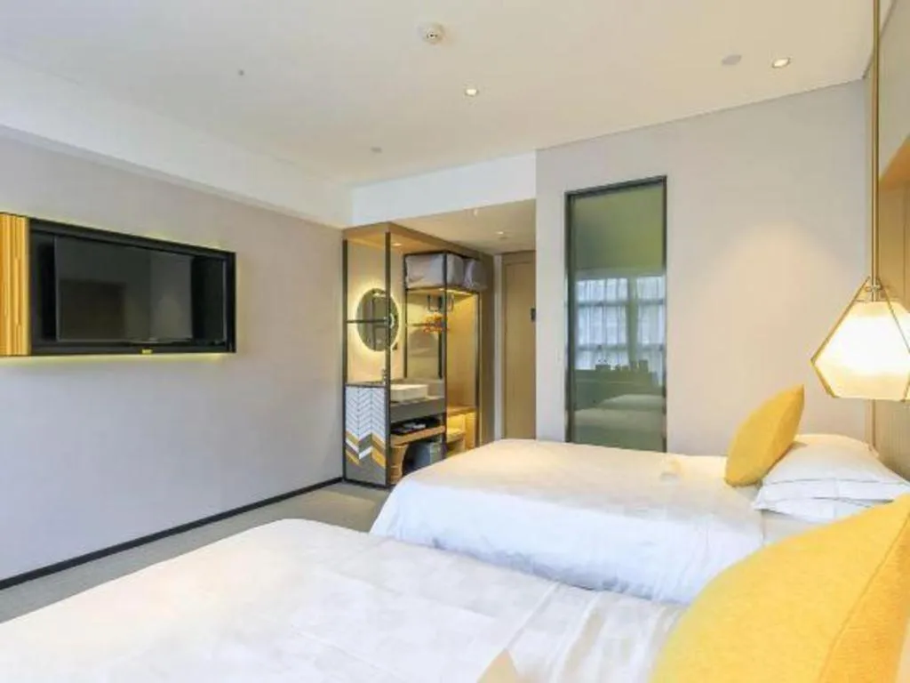 Bed in Nanning Sanzan Hotel