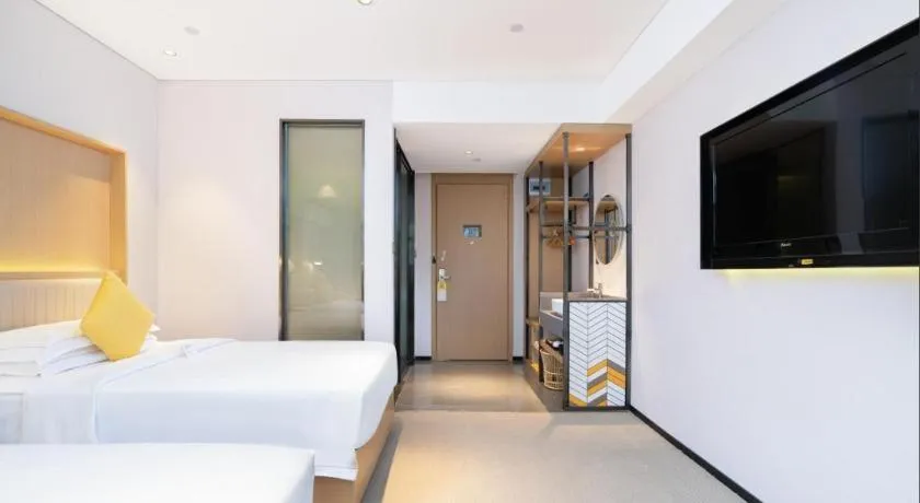 Bed in Nanning Sanzan Hotel