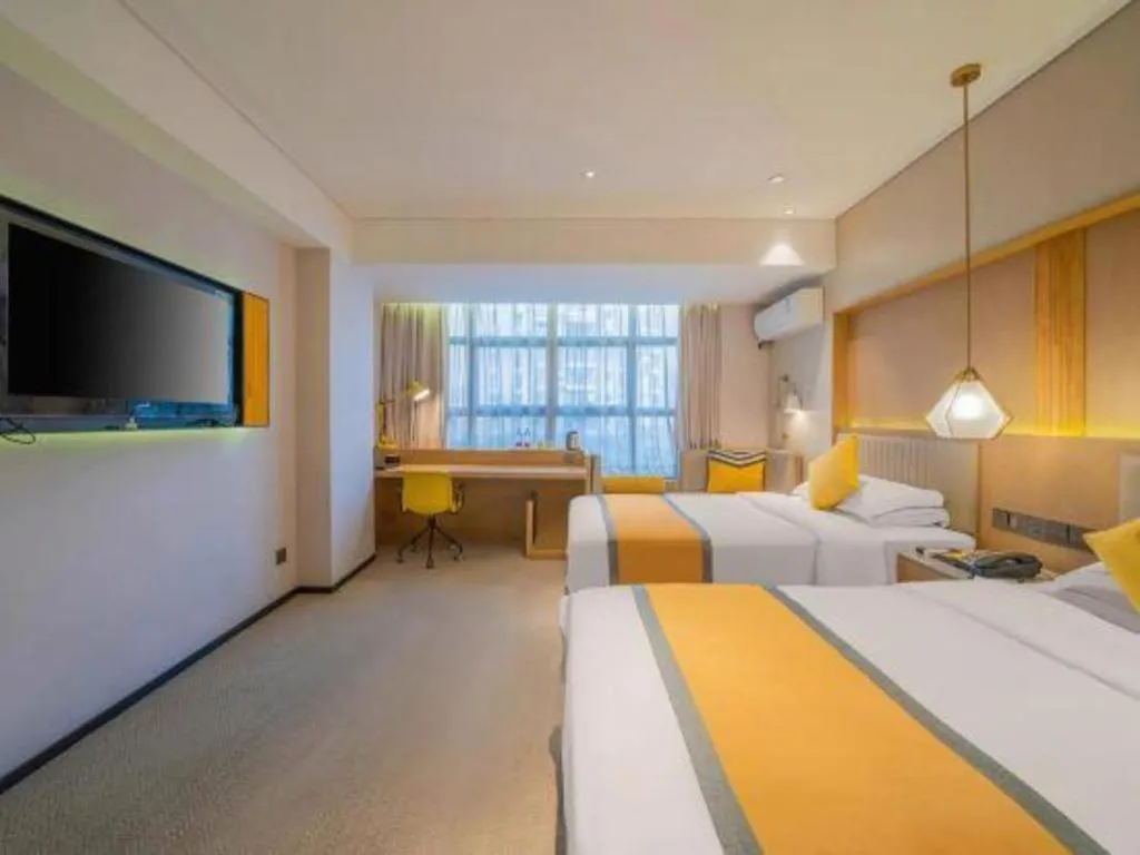 Bed in Nanning Sanzan Hotel