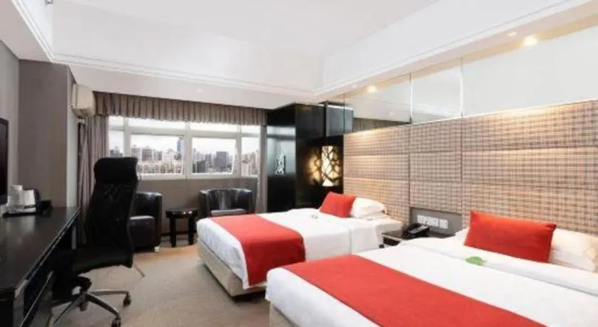 Bed in Nanning Sanzan Hotel