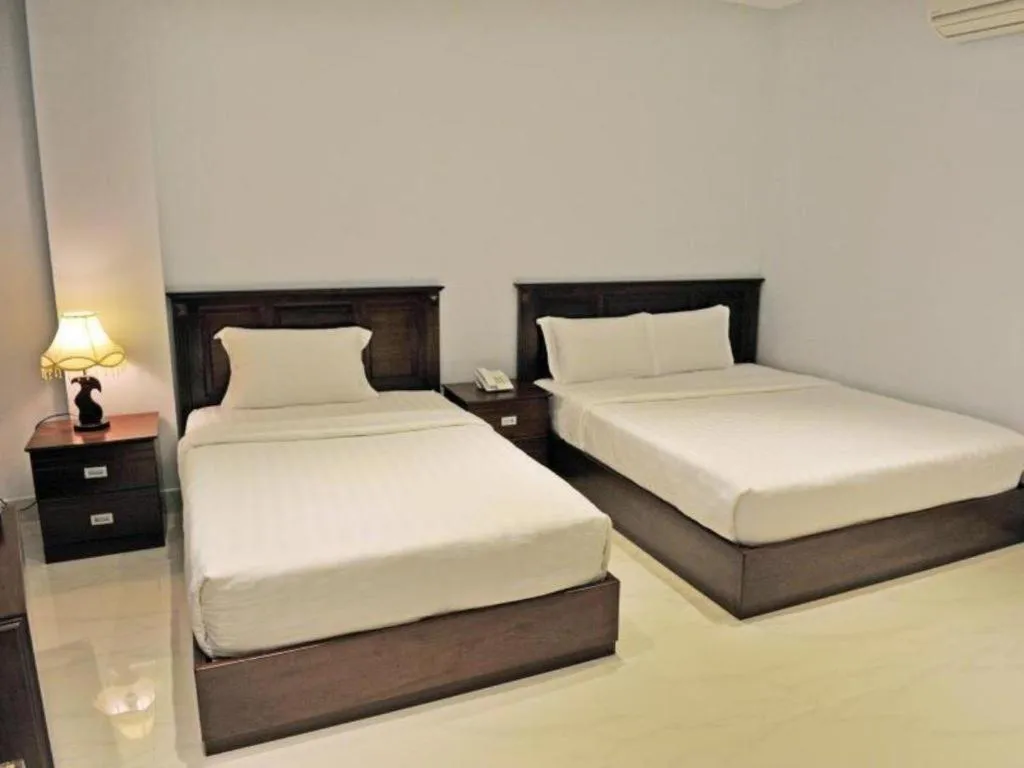 Bed in Phoenix Hotel Saigon