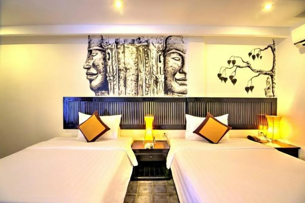 Bed in La Residence Blanc D' Angkor