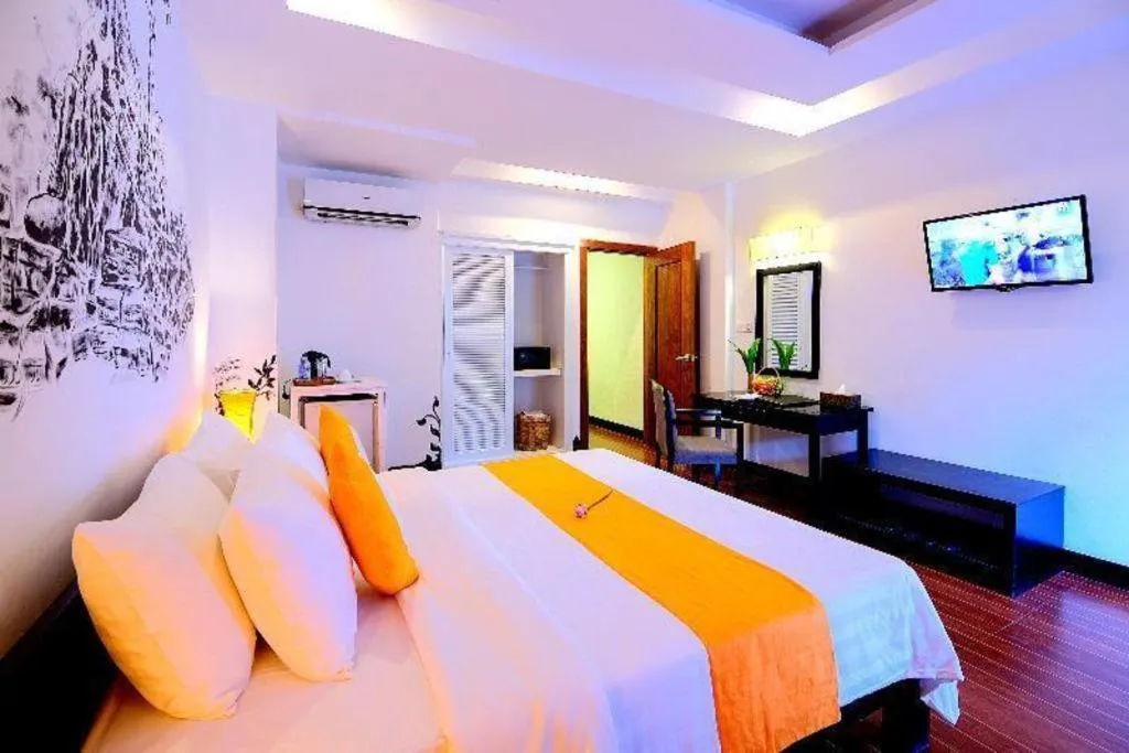 Bed in La Residence Blanc D' Angkor