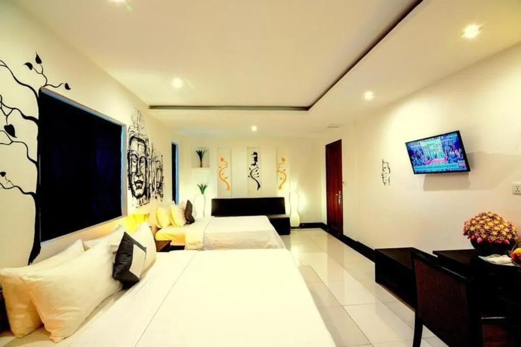 Bed in La Residence Blanc D' Angkor