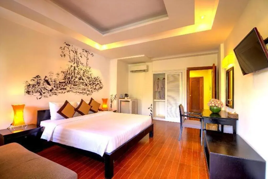 Bed in La Residence Blanc D' Angkor