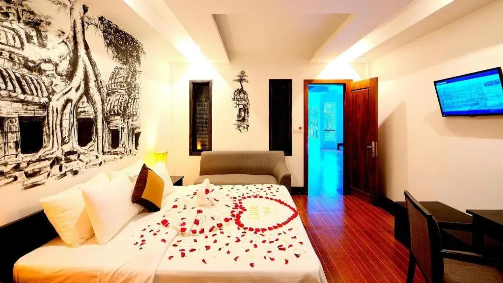 Bed in La Residence Blanc D' Angkor