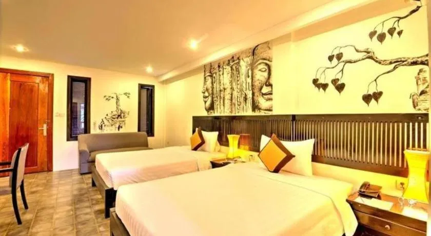 Bed in La Residence Blanc D' Angkor