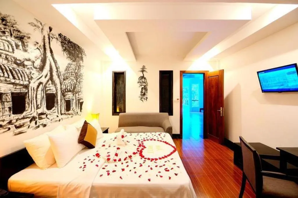 Bed in La Residence Blanc D' Angkor