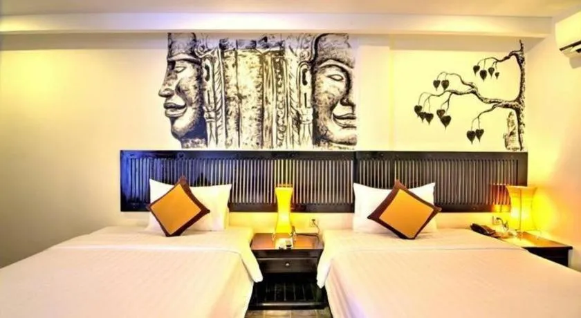 Bed in La Residence Blanc D' Angkor