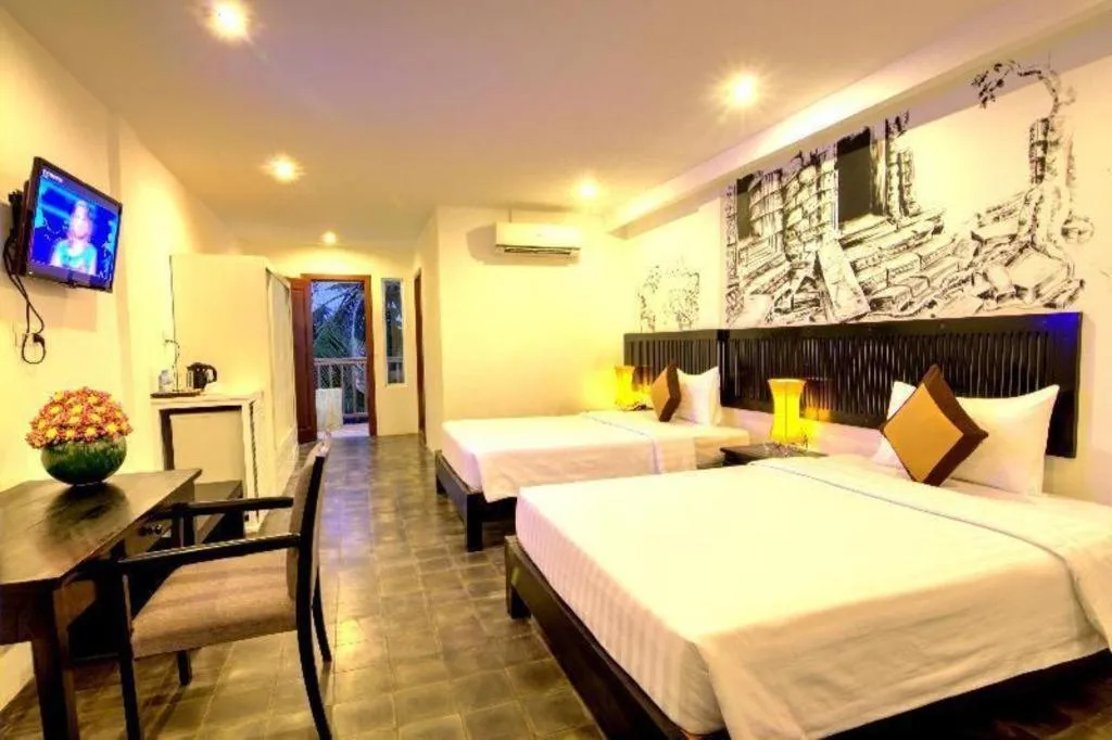 Bed in La Residence Blanc D' Angkor