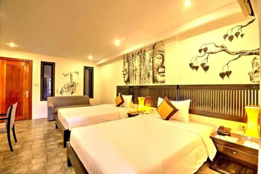 Bed in La Residence Blanc D' Angkor