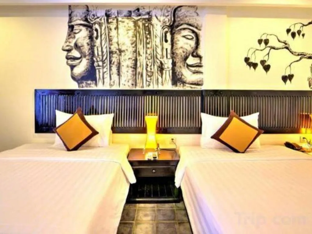 Bed in La Residence Blanc D' Angkor