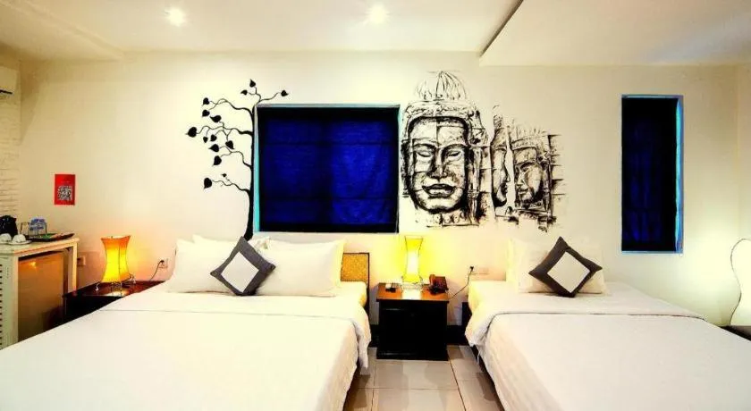 Bed in La Residence Blanc D' Angkor