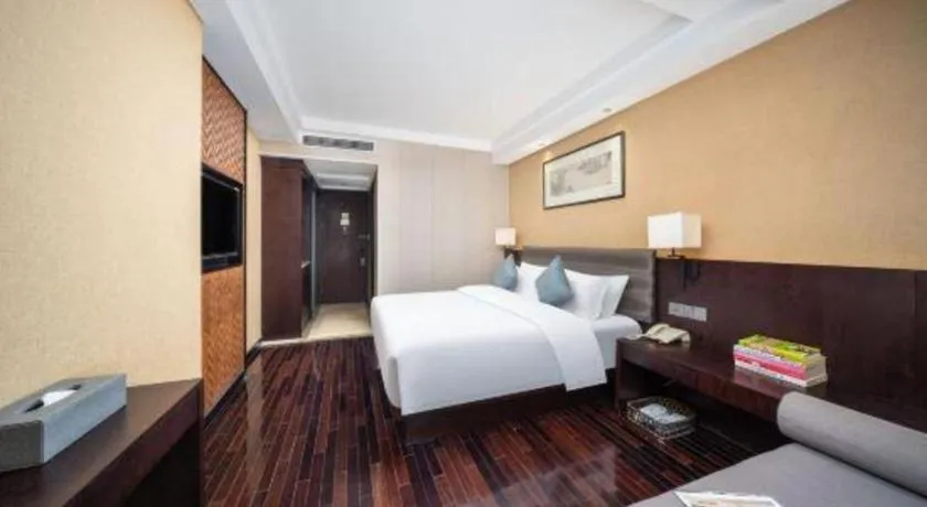 Bed in Yiwu Orange Boutique Hotel