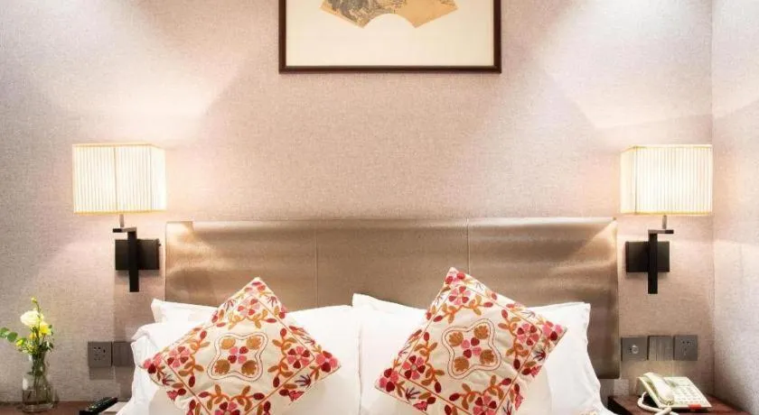 Bed in Yiwu Orange Boutique Hotel